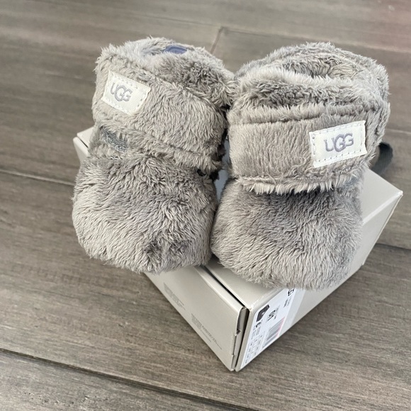 UGG Other - Ugh boots size 0 to 6 months brand new. Original packaging new.
